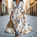 Women's Floral Print Maxi Dress With Deep V-Neck & Flare Sleeves