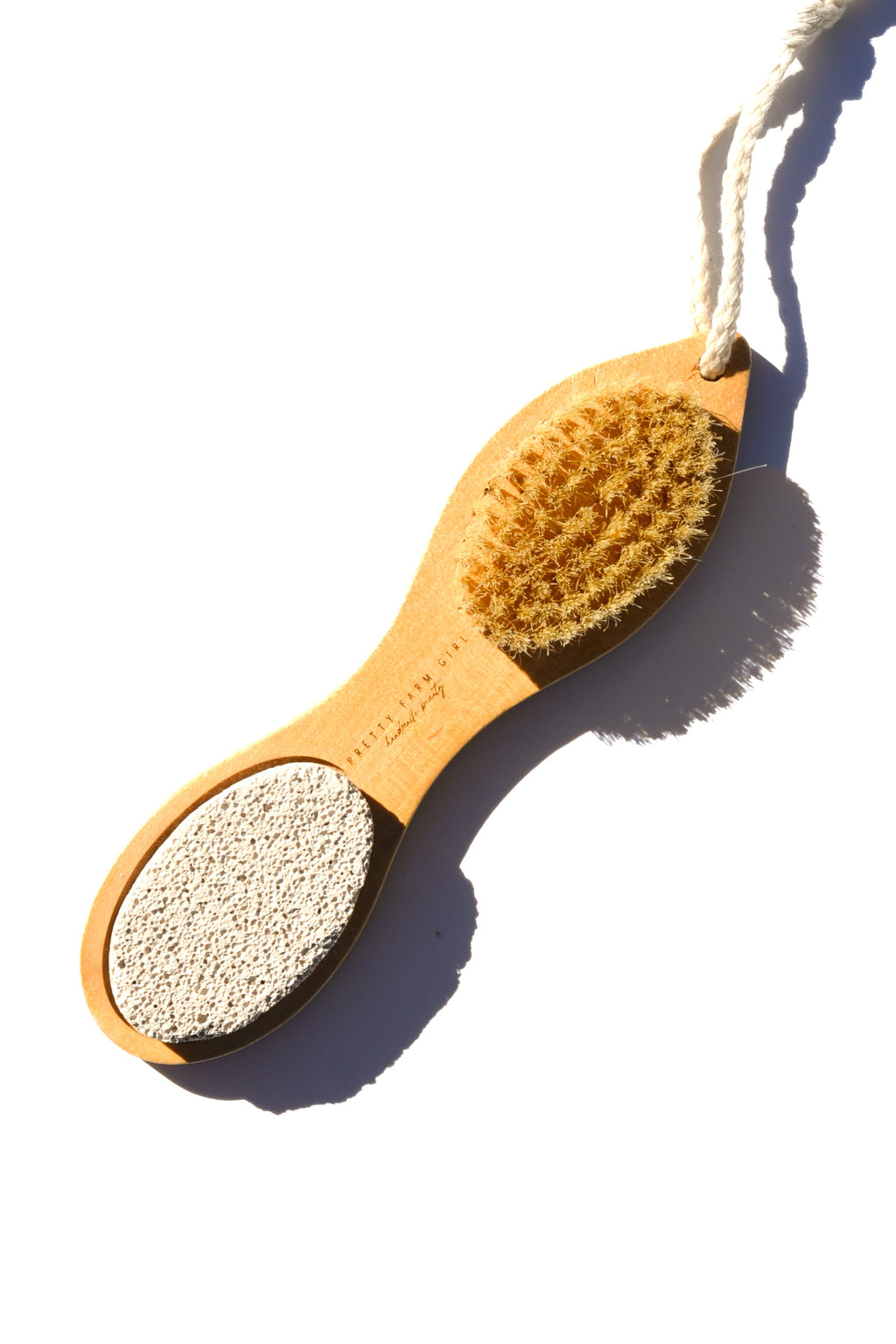 Herramienta exfoliante de bambú para pedicura