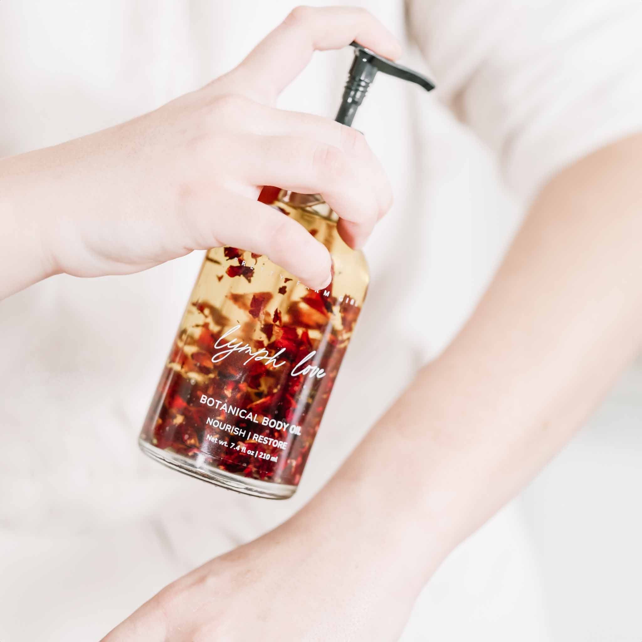 Aceite corporal Lymph Love para masajes