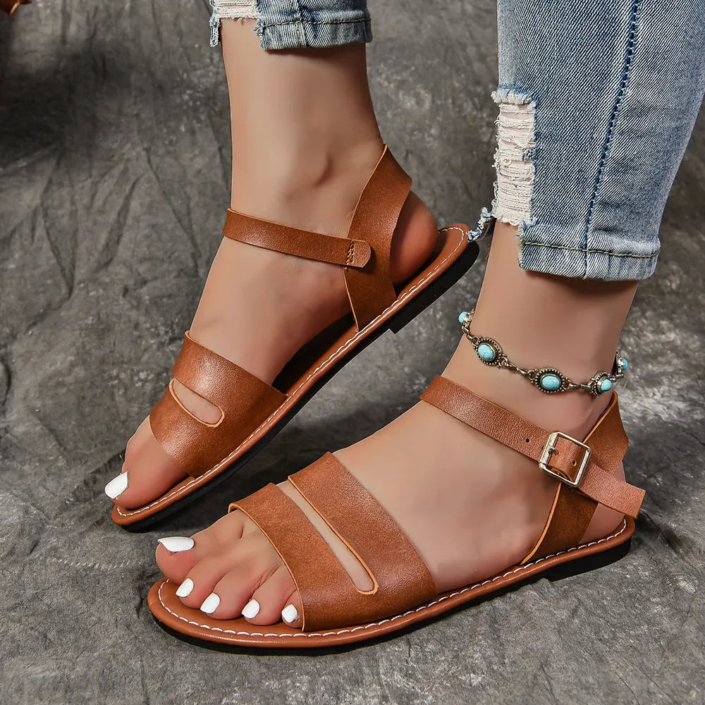 Sandalias planas con hebilla y punta abierta